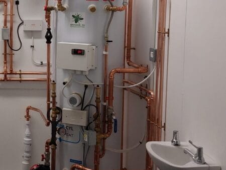 Low Temperature Heating and Hot Water Systems in Dwellings